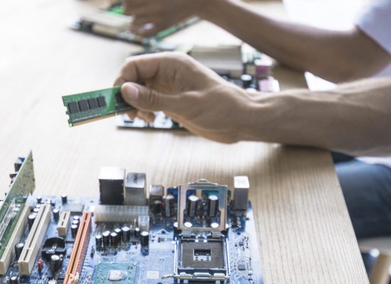 technician-repairing-computer-motherboard